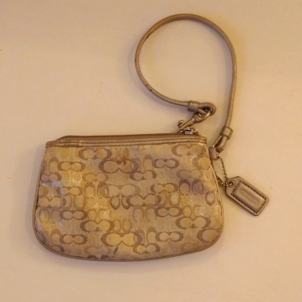 Coach Signature C wristlet.